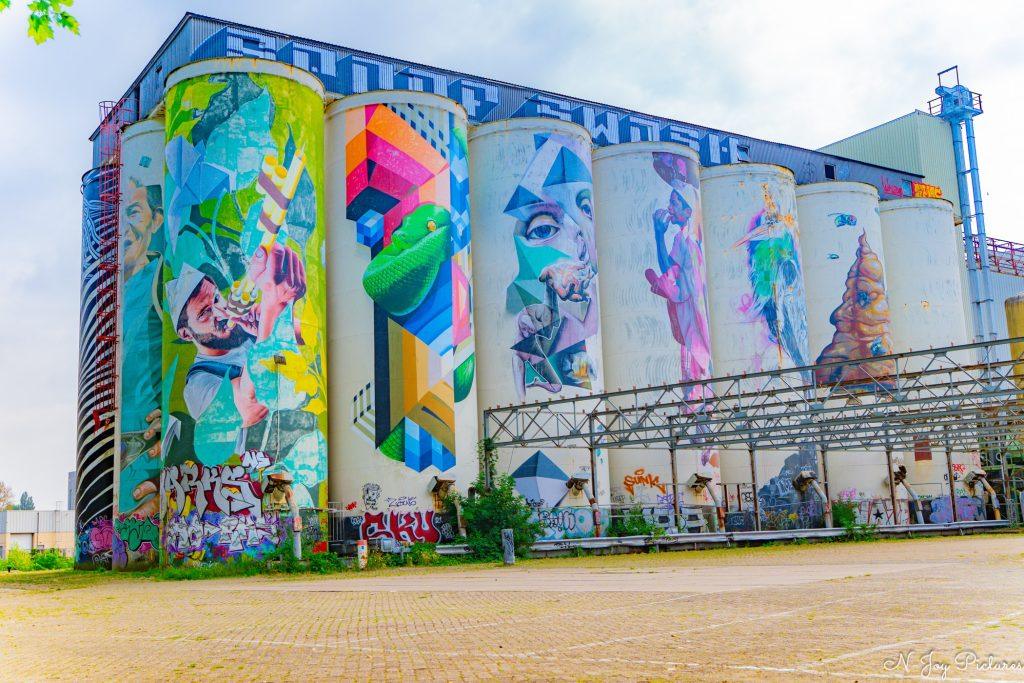 Street Art Fotografie 13 Dynamische street art fotografie op de Tramkade Den Bosch. Ervaar de vibe! Interesse? Neem contact op!