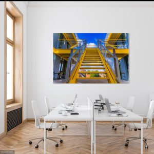 Geel metaal, strak design: Gebouw Staal Deventer in beeld. Architectuurfotografie die boeit. Bekijk het zelf!